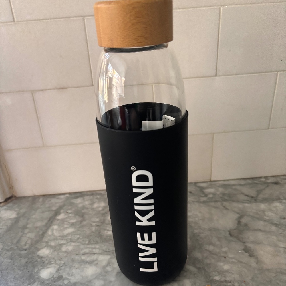 Brand new, LIVE KIND, glass bottle with insulated sleeve